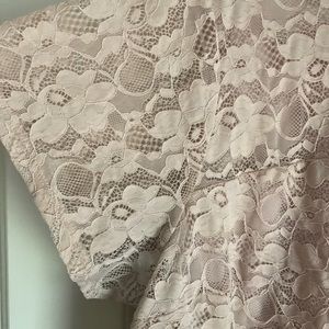 Lacy light pink top with shirt sleeves